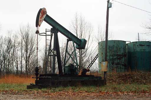 Pump jack and tanks